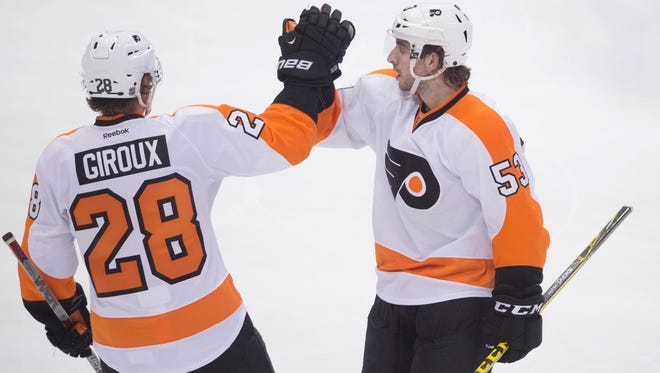 Claude Giroux, left, and Shayne Gostisbehere, right, were both added to rosters for the World Cup of Hockey Friday evening.