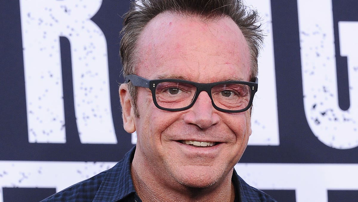 Tom Arnold is playing up his relationship with President Trump's former lawyer, Michael Cohen.