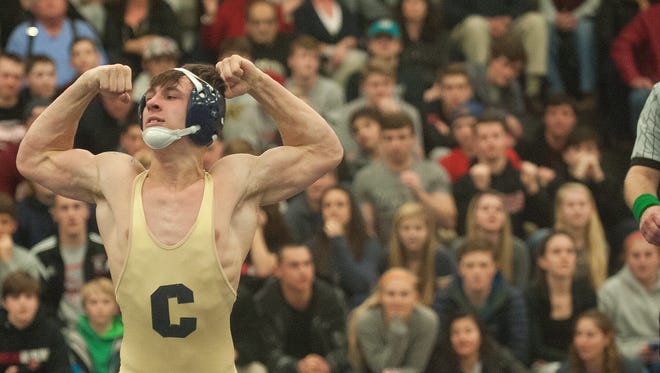 Collingswood's Christian Dolan flexes after a pin in the 152-pound bout against Jack Goldberg on Wednesday in the Panthers' 34-32 South Jersey Group 2 semifinal win.