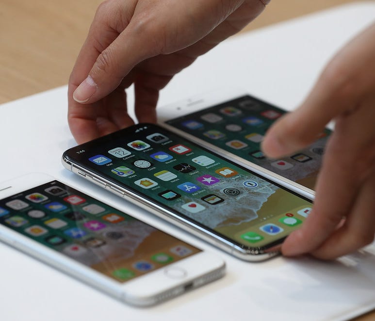 The new iPhone 8, iPhone X and iPhone 8S are displayed during an Apple special event at the Steve Jobs Theatre on the Apple Park campus on September 12, 2017 in Cupertino, Calif.