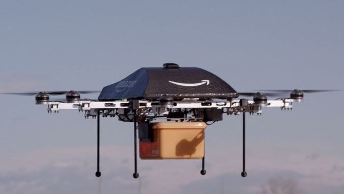 An Amazon photo showing a test of package delivery by drone