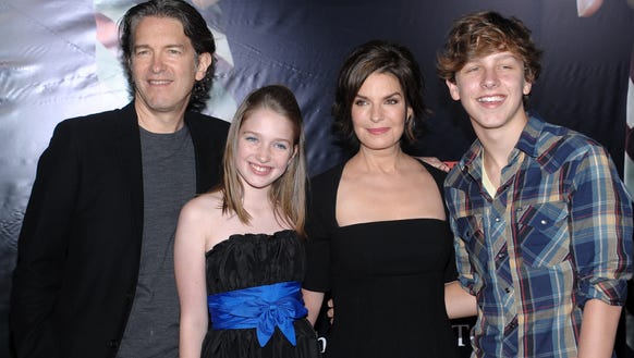 From left, Howard Sherman, Annabella Sherman, Sela Ward and Austin Sherman attend the premiere of The Stepfather at the School of Visual Arts Theater on Monday, Oct. 12, 2009, in New York.