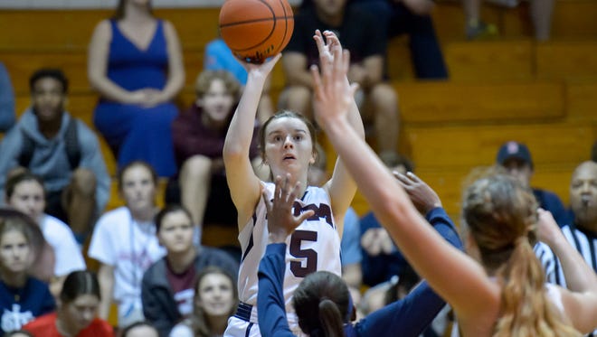 St. Thomas More's Carly Sloane provides a perimeter threat for the Lady Cougars.