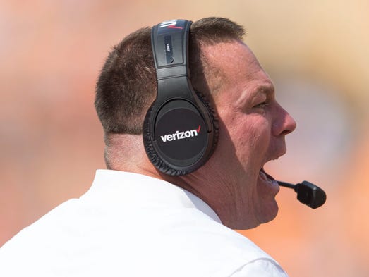 Tennessee Head Coach Butch Jones yells to the field