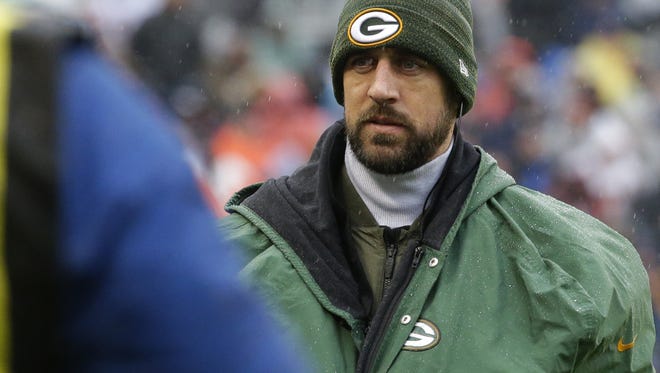 Injured Green Bay Packers' Aaron Rodgers walks the sideline during the fourth quarter of their game Sunday, November 12, 2017 at Soldier Field in Chicago, Ill. The Green Bay Packers beat the Chicago Bears 23-16.
MARK HOFFMAN/MILWAUKEE JOURNAL SENTINEL
