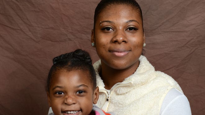 House of Hope: Kashayla Mitchell and her daughter, Kanylah Ramsey, Friday, December 5, 2014. H. Marc Larson/Press-Gazette Media/@HMarcLarson