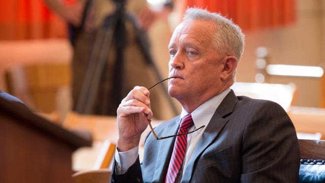 Hamilton County Prosecutor Joe Deters, right, listens to motions being argued in front of Hamilton Common Pleas Judge Patrick T. Dinkelacker concerning the re-sentencing of convicted serial killer Anthony Kirkland, 49.  This pertains to the deaths of Casonya Crawford, 14, in 2006 and Esme Kenney, 13, in 2009. He's admitted killing these two women and three others. This is a death penalty case.