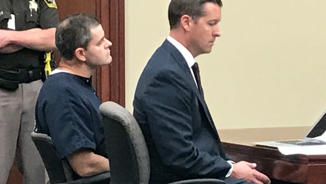 Kenneth Tennant, left, on Wednesday listens to a woman give a victim-impact statement at a sentencing hearing for accosting, enticing or soliciting a 15-year-old girl. Sitting next to Tennant is his attorney, Patrick O'Keefe.