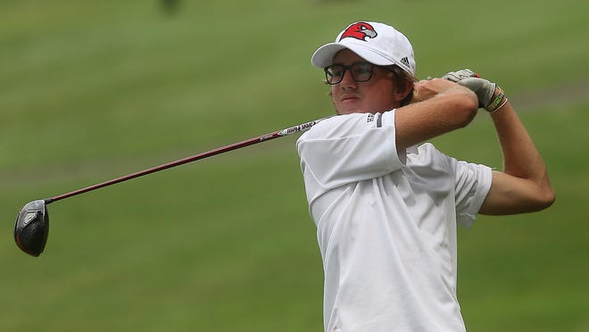 Hiland's Brookston Hummel watches his tee shot on the 18th hole at Fire Ridge Golf Course in Millersburg Wednesday during the IVC Preseason Tournament. Hummel shot a 3 under par 69.
