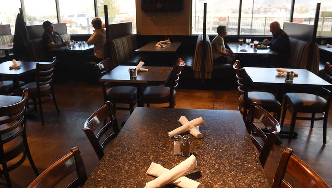 Patrons eat lunch at the recently reopened Twisted Fork restaurant in Reno on Nov. 24, 2015.