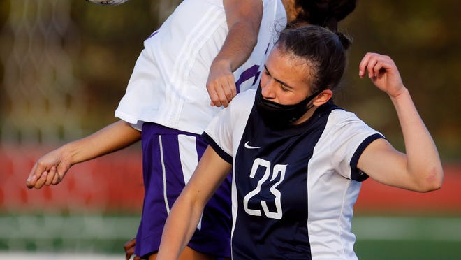 Kylie Viveiros (right, in action earlier this season against Classical) and the Johnston girls soccer team took down Woonsocket Friday afternoon.