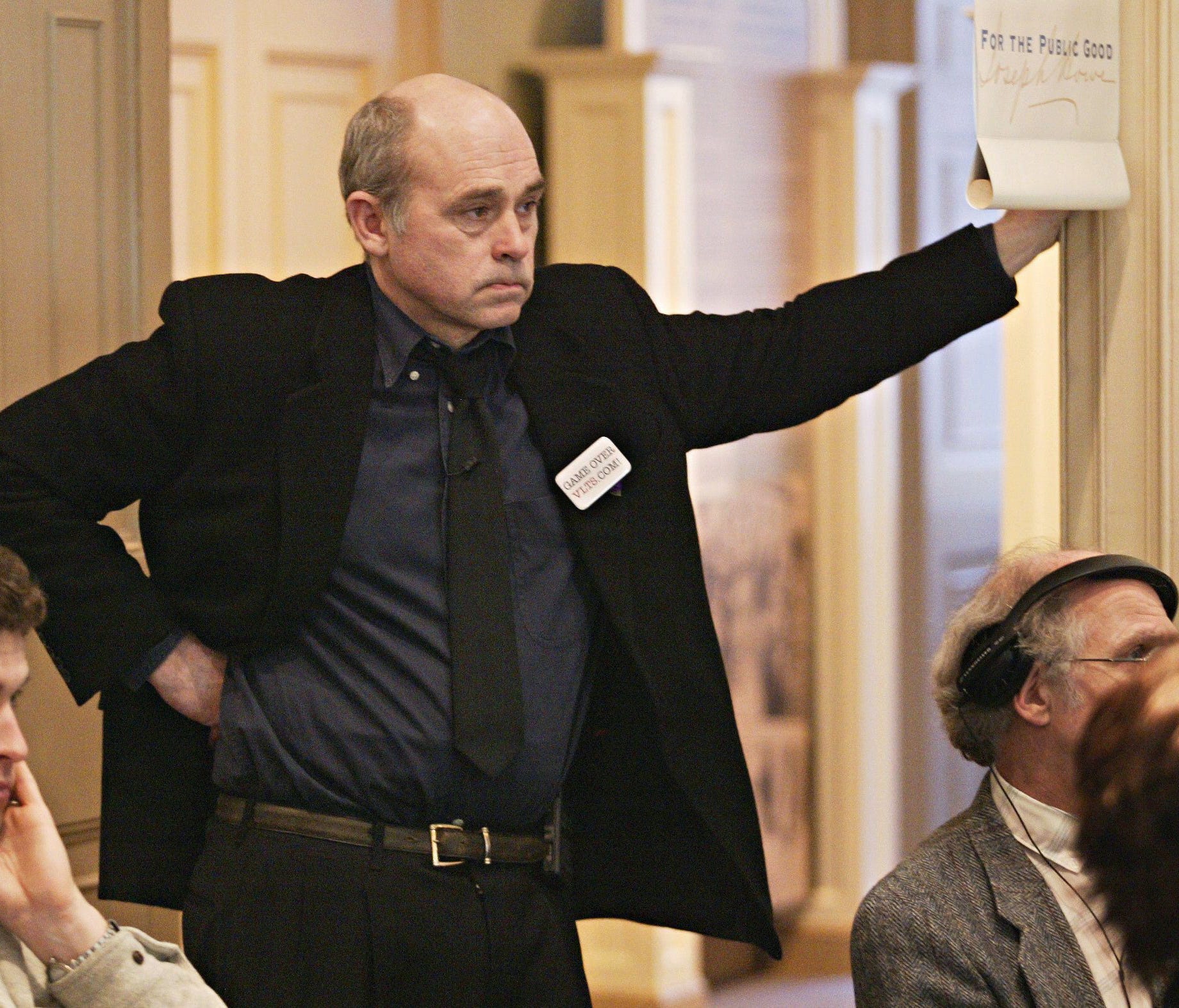 John Dunsworth listens to a speaker at a news conference in Halifax, Nova Scotia on April 12, 2005.