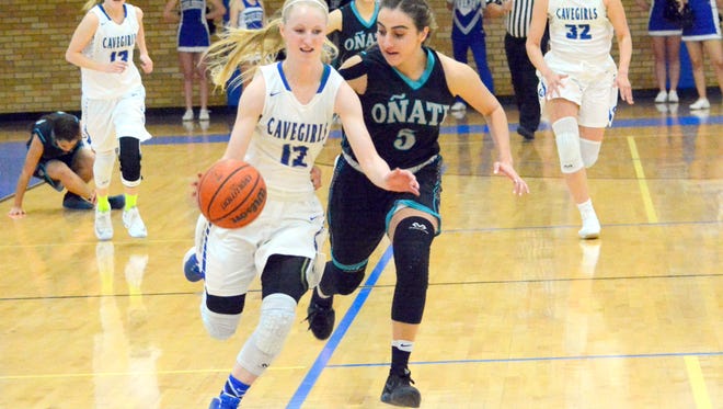 Carlsbad's Carsyn Boswell gets a steal and bolts toward the basket against Oñate in the District 3-6A tournament semifinals on Feb. 22. Boswell and Cavemen center Brenden Boatwright both garnered first-team all-state 6A team honors.