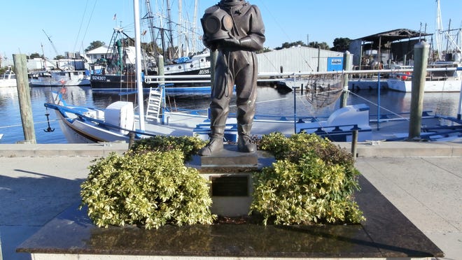 
A statue saluting traditional sponge divers is at the center of the Sponge Docks District in Tarpon Springs.
