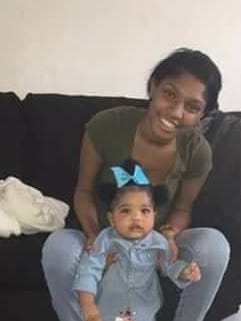 Trayona McDowell is pictured with her 10-month-old daughter in a family photo. McDowell was shot to death Nov. 9 in Okolona.