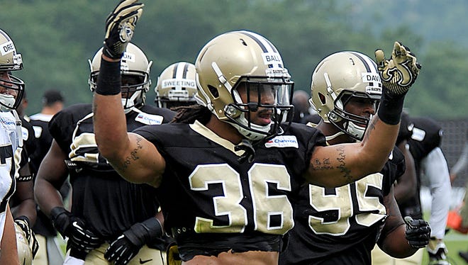 New Orleans Saints defensive back Marcus Ball (36) throws his hands to the fans during their NFL football training camp in White Sulphur Springs, W.Va.