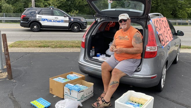 Chuck Osso of Fairfield sells golf balls out of egg cartons across the street from Huffman Park in Fairfield, outside of Cincinnati. He says Trump supporters still hear echoes of Hillary Clinton's "deplorable" comment in the 2020 election."This election isn't about Democratic policies or Republican politics," he said. "It's about the Trumpsters against the people who hate them."