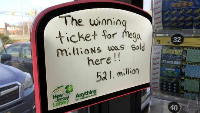 In a message photographed April 1, 2018, the owner of the Lukoil gas station and mini-mart on New Jersey 23 in Riverdale, N.J., is hoping lottery customers will think the store's Mega Millions luck will rub off on them.