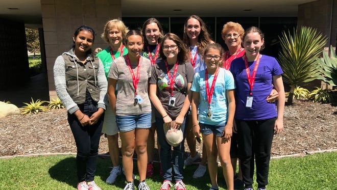 Shown are Tech Trek girls Uma Akundi, Emily Sorensen, Alicia Corral, and Sabrina Popick, plus two former techies, Olivia Aussem and Elizabeth Lindsborg, who were junior counselors. Also shown are dorm mom Amy Rieker, coding teacher Virginia Seaton and Assistant Director Judy Pfeil.