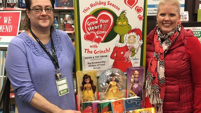 BAM!, or Books-A-Million, Inc., recently held a book and toy drive for Big Brothers Big Sisters of Fond du Lac County. Pictured are, from left: Ann Adler, manager Books-A-Million, Inc.; and Tammy Young, executive director, Big Brothers Big Sisters.