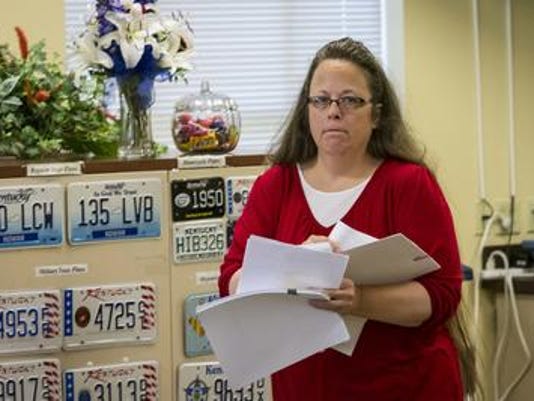 Kentucky clerk Kim Davis takes her battle against gay marriage to Romania