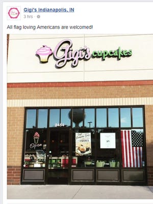 A post from Gigi's Cupcakes co-owner Nick Pappas on the cupcake shop's Facebook page, which reads, "All flag loving Americans are welcomed!" before Pappas later added a clarification.