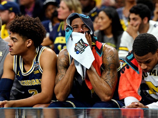 Michigan Wolverines guard Charles Matthews (1) reacts