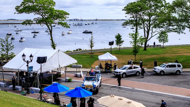 Cars line up during the 2020 graduation for Plymouth South High School, held on the waterfront at Plymouth Rock June 6.