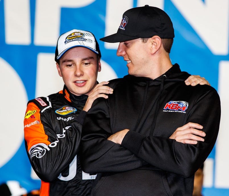 Kyle Busch, right, and Joe Gibbs Racing teammate Christopher Bell, after Bell won the Camping World Truck Championship. Busch will vie for his second NASCAR championship Sunday at the Ford EcoBoost 400 at Homestead-Miami Speedway.