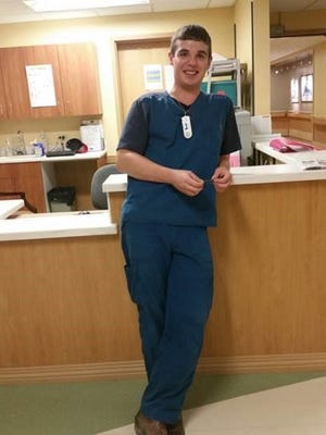 Certified nursing assistant Andrew Rucinksy on the job at Benefis Health System. Rucinsky says Job Corps training helped him focus on a medical career he loves. He’s also taking classes to became a registered nurse, with Benefis picking up the tuition.