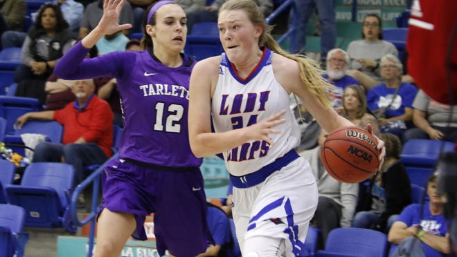 Lubbock Christian University basketball player Maddi Chitsey, right, on Tuesday was named the women's winner of the Lone Star Conference Fred Jacoby academic athlete of the year for all sports.