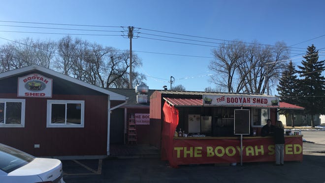 The Booyah Shed's food truck is set up outside its new home at 1800 Ashland Ave. Owner Dan Nitka expects to open the dining room next week and begin cooking out of the kitchen in four weeks.