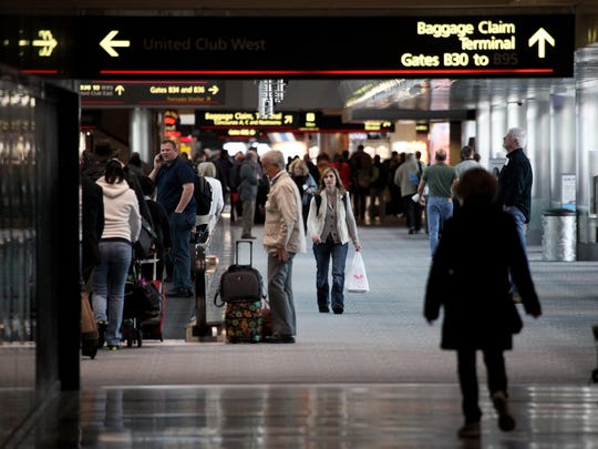 Talking gargoyle shocks travelers at Denver International ...