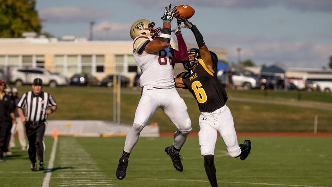 Kellen Williams (82) of Kutztown University tries to make a catch of a pass earlier this season. He has 31 catches for 450 yards and six TDs this fall.