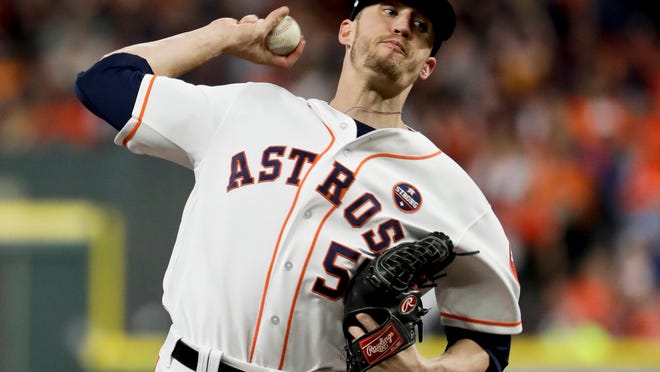Houston Astros relief pitcher Ken Giles throws against the Los Angeles Dodgers during the ninth inning of Game 4 of baseball's World Series Saturday, Oct. 28, 2017, in Houston. (AP Photo/Matt Slocum)