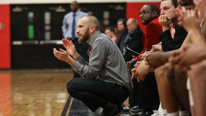 Kody Kubbs watches his team during the Red Raiders' home game against East Gaston on Jan. 5.