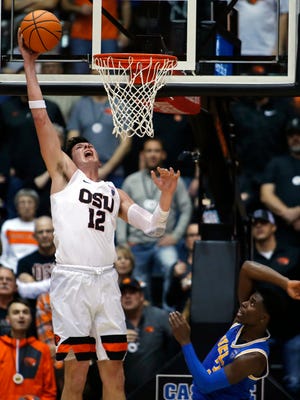 Oregon State's Drew Eubanks scores during the second half of the team's NCAA college basketball game against UCLA in Corvallis, Ore., Thursday, Jan. 18, 2018. Oregon State won 69-63. (AP Photo/Timothy J. Gonzalez)