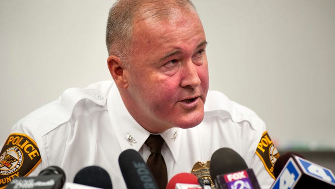 St. Louis County Police Chief Jon Belmar delivers remarks during a news conference, Sunday, Aug. 10, 2014, in Ferguson, Mo.