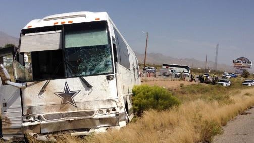 A scene from the site of a crash involving a Dallas Cowboys bus near Dolan Springs, Ariz.