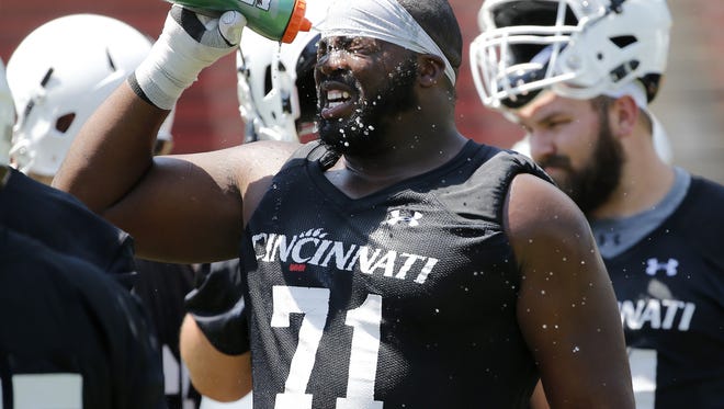 Former Cincinnati Bearcats offensive tackle Korey "Big Country" Cunningham is projected as a potential NFL Draft seventh-round choice by several websites.
