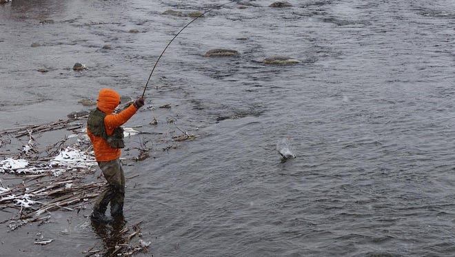 Craig Mathews fishes the Madison River in winter with his tenkara rod.
