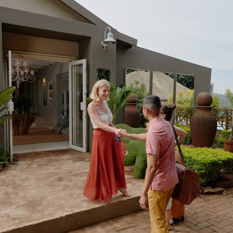 Guests check in to an Airbnb in Africa.