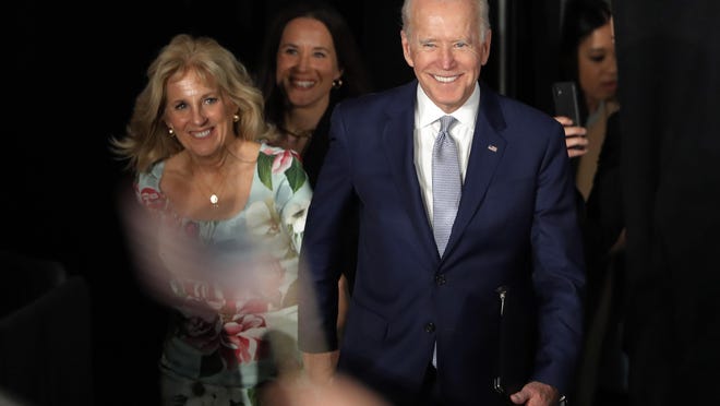 Democratic presidential candidate former Vice President Joe Biden arrives for a primary night election rally with his wife Jill Biden in Columbia, S.C., Saturday, Feb. 29, 2020, after winning the South Carolina primary. (AP Photo/Gerald Herbert)