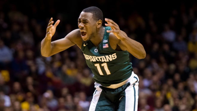 Michigan State point guard Tum Tum Nairn Jr. yells for the ball in the first half of the Spartans' 69-61 win Saturday at Minnesota. With Denzel Valentine injured, Nairn has taken on the role as the voice of the team.