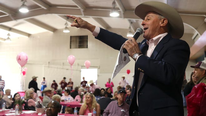 Matt Wolters accepts bids during an auction at the Tehama District Fair grounds during the Tough Enough to Wear Pink Luncheon on Tuesday in Red Bluff. The Red Bluff Round-Up rodeo comes to the fairgrounds Friday, Saturday and Sunday.
