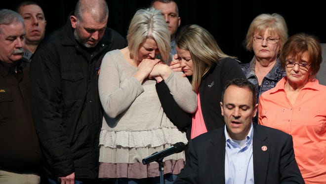 Secret Holt, center with beige sweater, and Jasen Holt, next to her, became emotional as Gov. Matt Bevin, sitting, issued a statement of support for victims of the Marshall County High School shooting. Their daughter Bailey Holt was shot and killed during the shooting.    They were at the ChildrenÕs Arts Center in Benton, Ky.
Jan. 26, 2017
