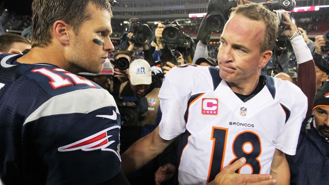 New England Patriots quarterback Tom Brady (12) shakes hands with Denver Broncos quarterback Peyton Manning (18) following a 2012 game at Gillette Stadium.