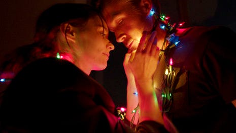 This image released by Broad Green Pictures shows Rooney Mara, left, and Ryan Gosling in a scene from, "Song to Song."