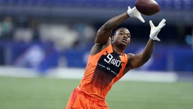 Alabama Crimson Tide wide receiver Amari Cooper catches a pass during the 2015 NFL Combine at Lucas Oil Stadium in Indianapolis on Feb. 21, 2015.