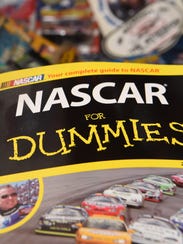 A book titled "NASCAR for Dummies," part of Donna Brunow's